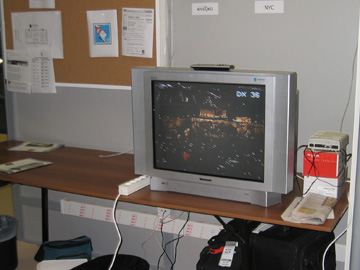 A television in the main press center